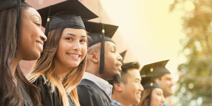 Latin descent female college student graduation on campus. Scholarship for College Students